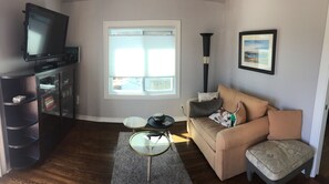 TV/Living area with Love Seat sleeper