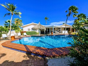 Your own private pool, gardens, and swim-up pool bar!