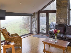 Comfortable living area | The Stables - Tyddyn Iolyn, near Criccieth