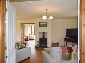 Spacious living room with wood burner | Solitude, Aberhafesp, near Newtown