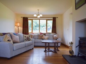 Spacious living room with wood burner | Solitude, Aberhafesp, near Newtown