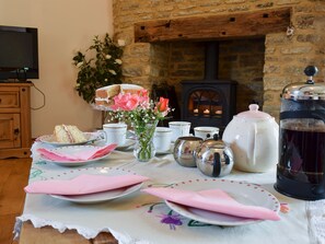 Beamed living room with wood-burning stove | Alfie&rsquo;s Barn, Ambrosden