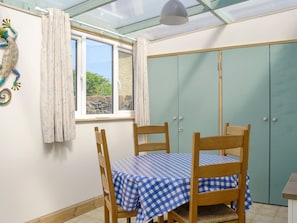Light and airy conservatory with dining area | Mill Street, Drummore, near Stranraer
