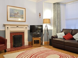Spacious living room with lovely gas coal-effect fire | Chartfield, Windermere