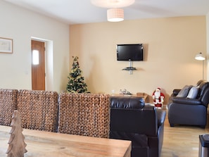 Living/dining area decorated for Christmas | Beudy - Bwlch Y Person Barns, Dihewyd, near Aberaeron