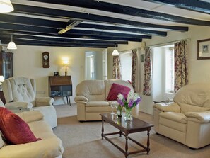 Spacious living room with beams | Ty Cornel, Aberporth, near Cardigan