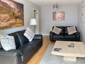 Comfortable lounge with 52” Sky HD TV with Netflix | Crossburn Hideaway, Arden, near Helensburgh