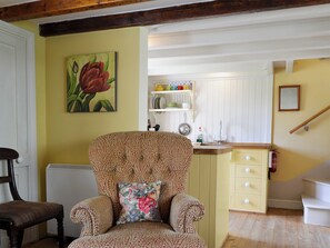 Beamed open-plan living room with multi-fuel burner | Brook Cottage, Eardisley
