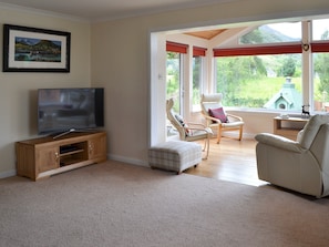 Relaxing lounge with Sky Smart TV | River Mill House, Ballachulish, near Fort William