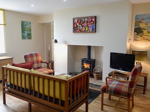 Relaxing living and dining room with multi-fuel burner | Brier Dene End Cottage - Brier Dene Farm Cottages, Old Hartley, near Whitley Bay 