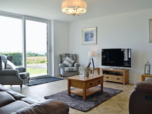 Beautifully decorated living area | The Steading - Glenskinno, Montrose