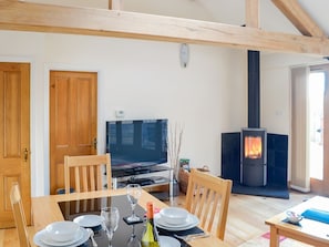 Cosy and comfortable living space with wood burner | Stratton Mill, Cirencester