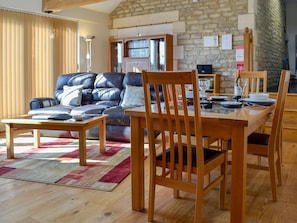 Beautiful wood-floored living and dining area | Stratton Mill, Cirencester