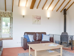 Warm and welcoming living area | Leyfield Coach House, Kirkby Lonsdale