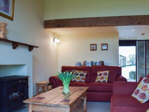 Comfortable beamed living room | Stable Cottage - Town End Farm Cottages, Airton, near Skipton