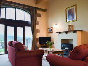 Beautiful high-ceilinged living room with far-reaching views | Stable Cottage - Town End Farm Cottages, Airton, near Skipton