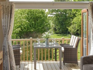 Charming decked area | Rockville Lodge - Rockville Farm, Bempton, near Flamborough