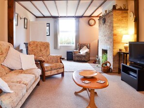 Living room with feature brickwork fireplace | Pam’s Plaice, Offord D’Arcy, near Godmanchester