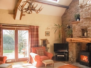 Light and bright living room with patio doors to the garden | Garden Cottage - Hole House Farm Cottages, Pooley Bridge, nr. Ullswater