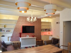 Living space with TV | Honeyz Hideaway, Whitby
