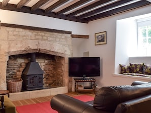 Cosy living room with wood burner | Hound Cottage, Burford