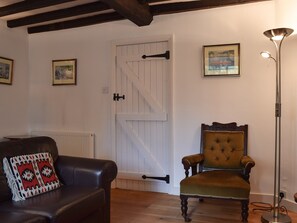 Cosy living room with wood burner | Hound Cottage, Burford