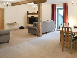 Open plan living space with character | The Gearings - Spindlestone Mill Apartments, Belford, near Bamburgh