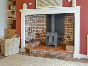 Fantastic feature fireplace in living room | Apple Tree Cottage, Near Holt