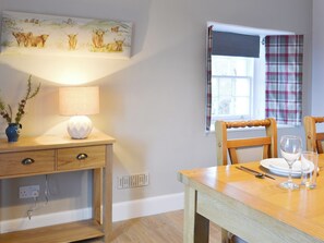 Wood-floored dining room | Glebe Cottage, Urray, near Dingwall