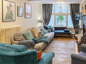 Living room leading through to dining area | Nell’s Cottage, Bridlington