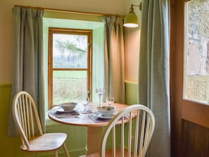 Modest dining area with garden view | St Orans, Dunphail, near Forres