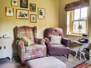 Cosy living room with woodburner | Penny Cottage, Bonsall, near Matlock