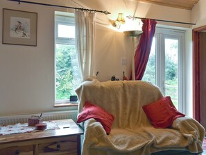 Comfy seating and French doors to garden | Mickrandella, Rollesby