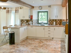 Well equipped kitchen area | The Grain Rooms - Spindlestone Mill Apartments, Belford, near Bamburgh