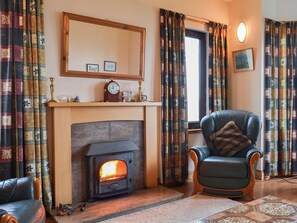 Delightfully cosy living room with multi-fuel burner | Sealladh Lingeigh, East Kilbride, near Lochboisdale, South Uist