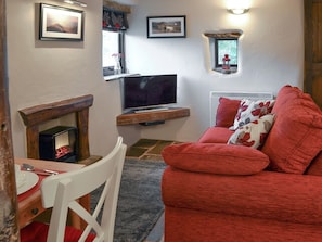 Cosy lounge area of open-plan living space | The Old Stable, Barber Booth, near Edale