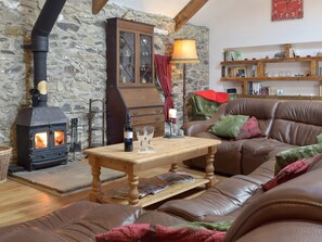 Warm and cosy living area with wood burner | Upper Farms Barns - Swallow Lodge - Upper Farm Barns, Mathry, near St Davids