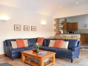 Large leather corner settee | Riccal Heads - Grange Farm Cottages, Spaunton, near Lastingham