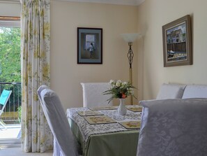 Elegant dining table and chairs with a fantastic view of the river | Riverside, Newton Stewart
