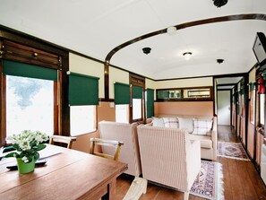 Living room/dining room | Brockford Railway Sidings - Railway Carriage Two, Brockford, nr. Stowmarket