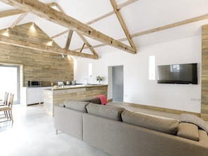 Spacious open plan living space with beamed ceiling | Clawdd-Y-Parc, near Llangybi