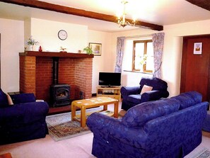 Welcoming living room | Stildon Manor Cottage, Menith Wood