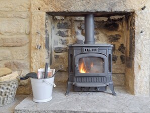 Welcoming wood burning fire | Blackcurrant Cottage at Stanton Ford Farm, Baslow, near Bakewell