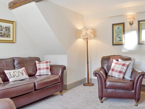 Comfy seating within living room | Blackcurrant Cottage at Stanton Ford Farm, Baslow, near Bakewell