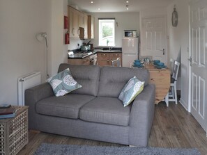 Tastefully furnished open plan living space | Teal House, Amble