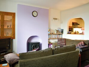 Delightful living space with electric woodburner | View Cottage, Settle