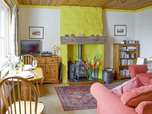 Welcoming living area with wood burner | Cuillin View, Husabost, Isle of Skye