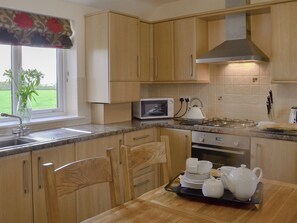 Charming kitchen area | Roosters - Mill Farm Cottages, Near Chapel St Leonards
