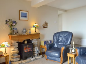 Cosy lounge with feature fireplace | Low Tide - Low Tide and High Tide, Cellardyke, near Anstruther