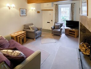 Historic exposed wooden beams in living room | Ivy Cottage, Grassington, near Skipton